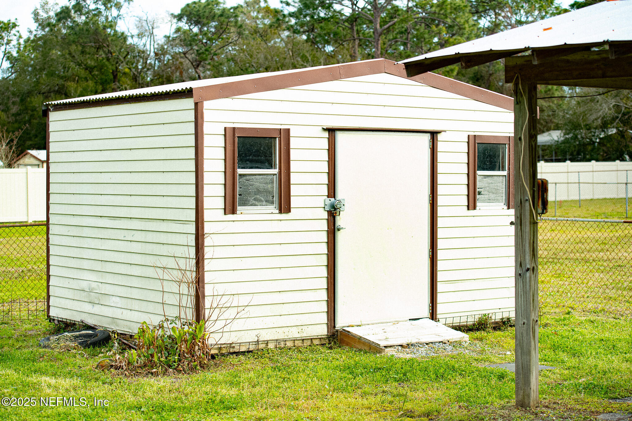 13203 Dunn Creek Road Jacksonville, FL 32218 - Photo 7 of 14 Metal Storage Shed Exterior