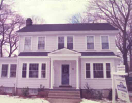 56 Charlotte Road Newton, MA 02459 - Photo 1 of 1 a front view of a house with a yard