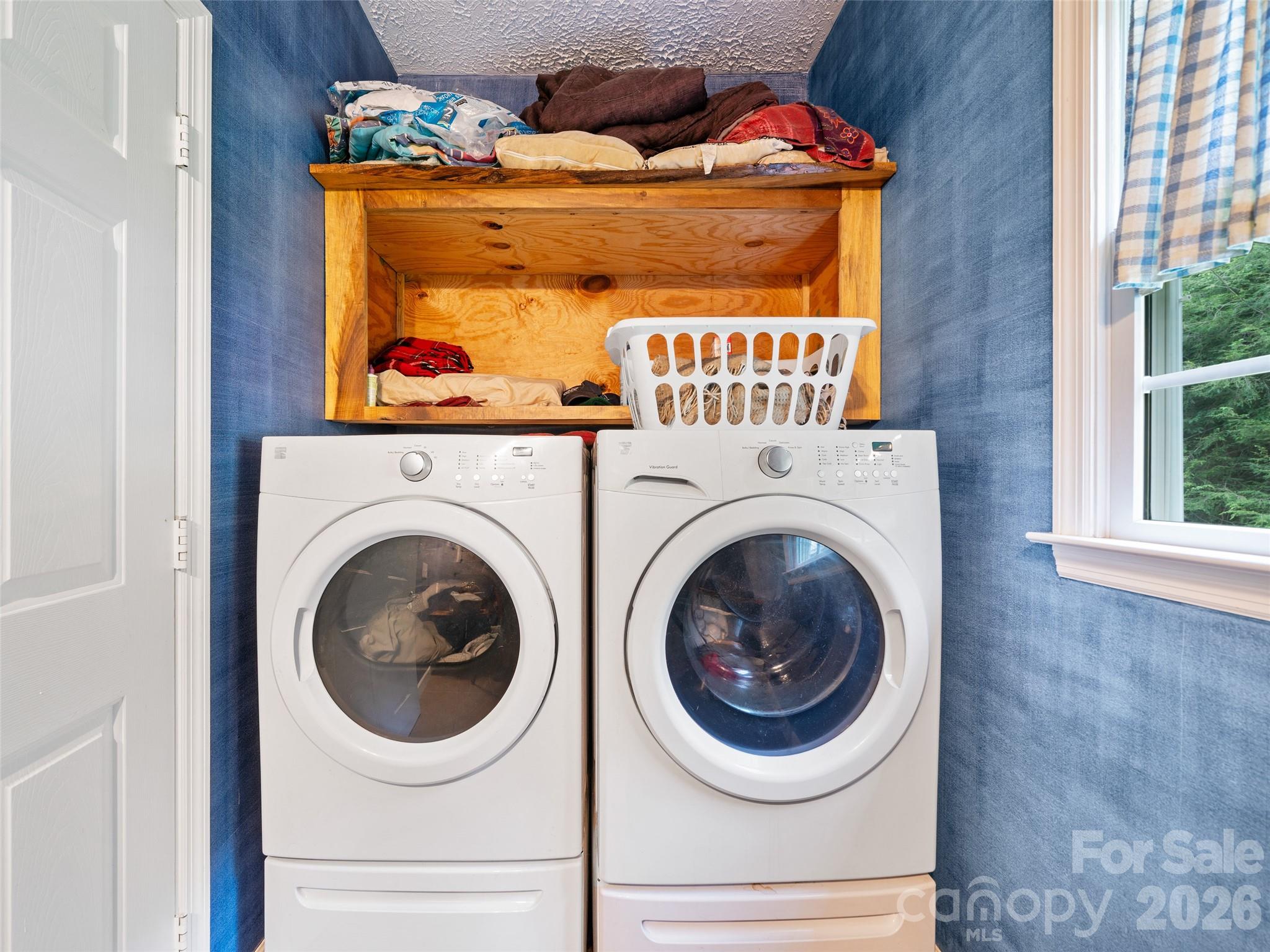 2216 Beans Creek Road Bakersville, NC 28705 - Photo 20 of 39 a utility room with dryer and washer