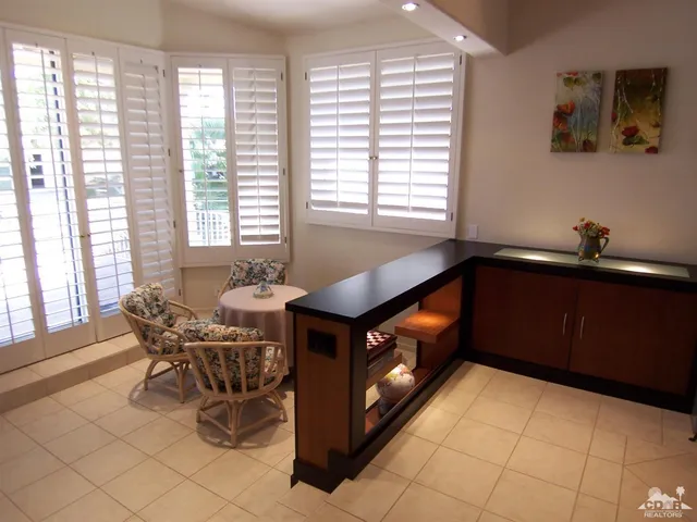 a kitchen with a stove and a cabinets