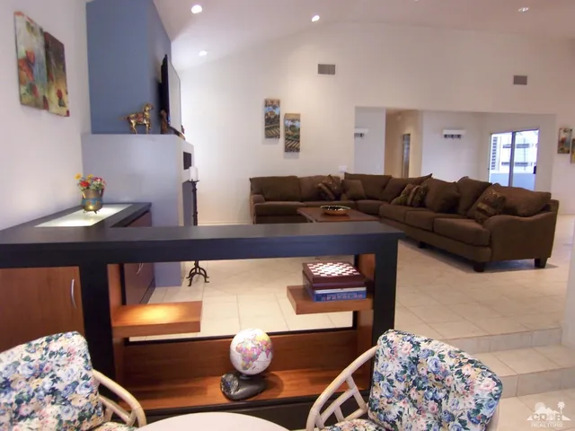 a living room with furniture and a couch