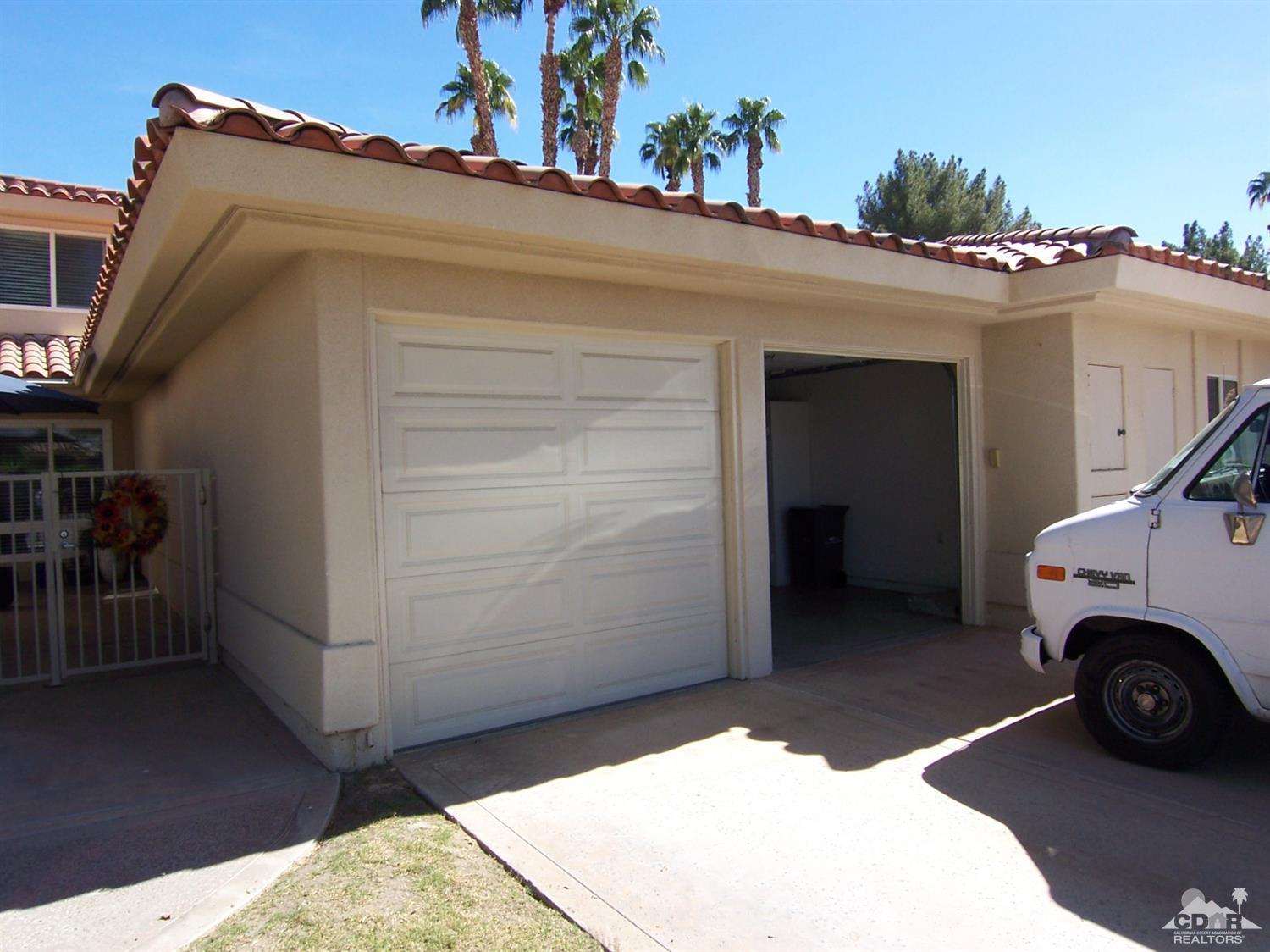 195 Desert Lakes Drive Rancho Mirage, CA 92270 - Photo 24 of 28 a view of a house with a garage