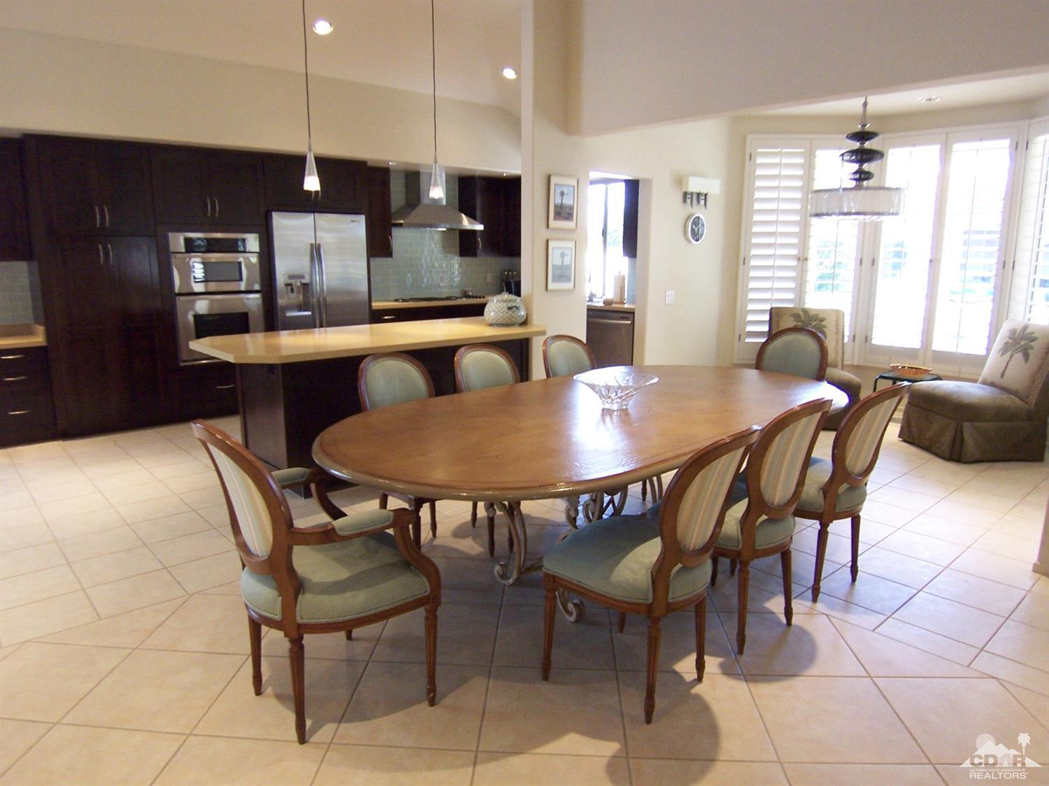 195 Desert Lakes Drive Rancho Mirage, CA 92270 - Photo 7 of 28 a dining room with furniture and window