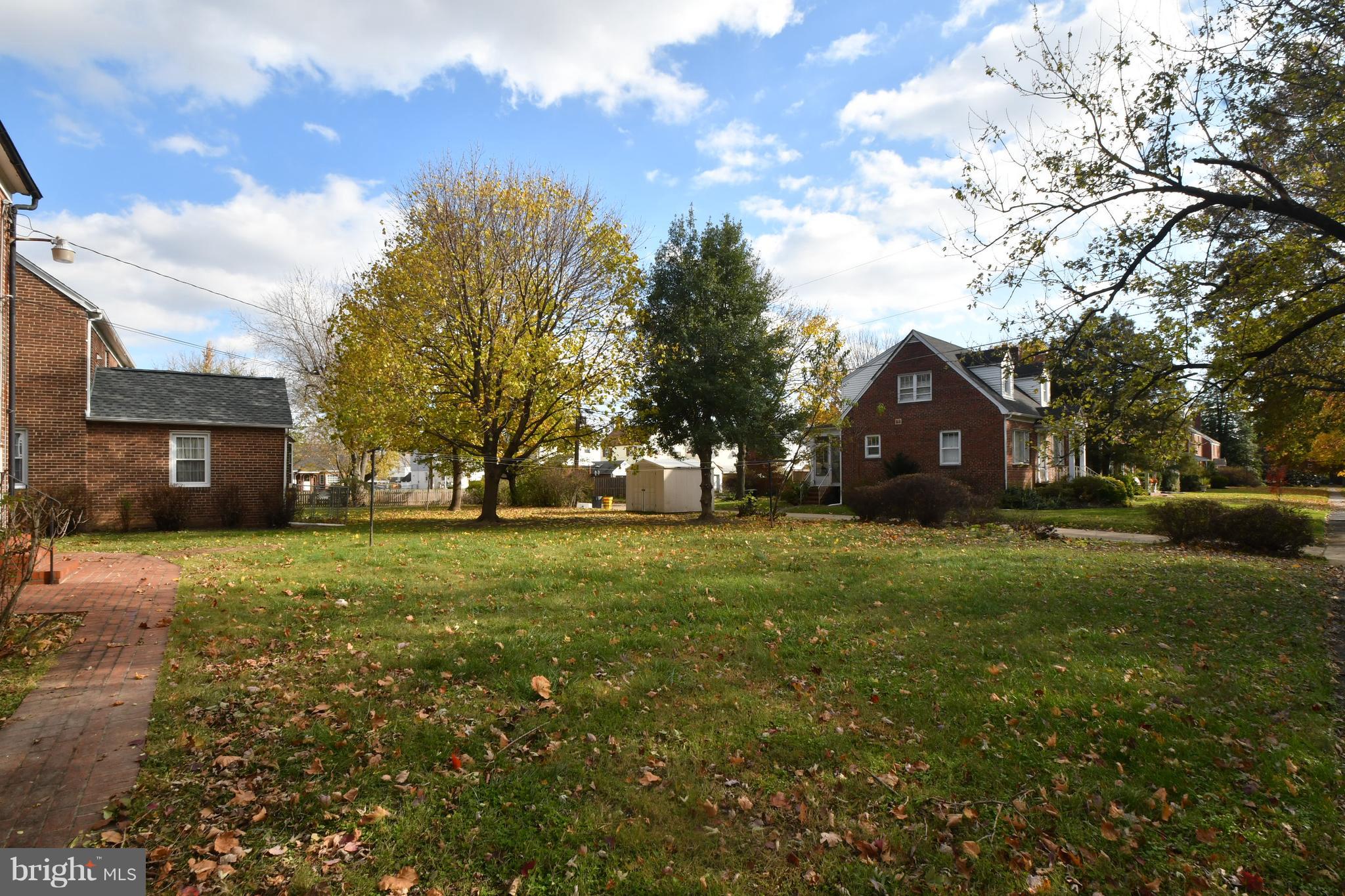 7009 Mornington Road Dundalk, MD 21222 - Photo 42 of 48 a front view of a house with a yard