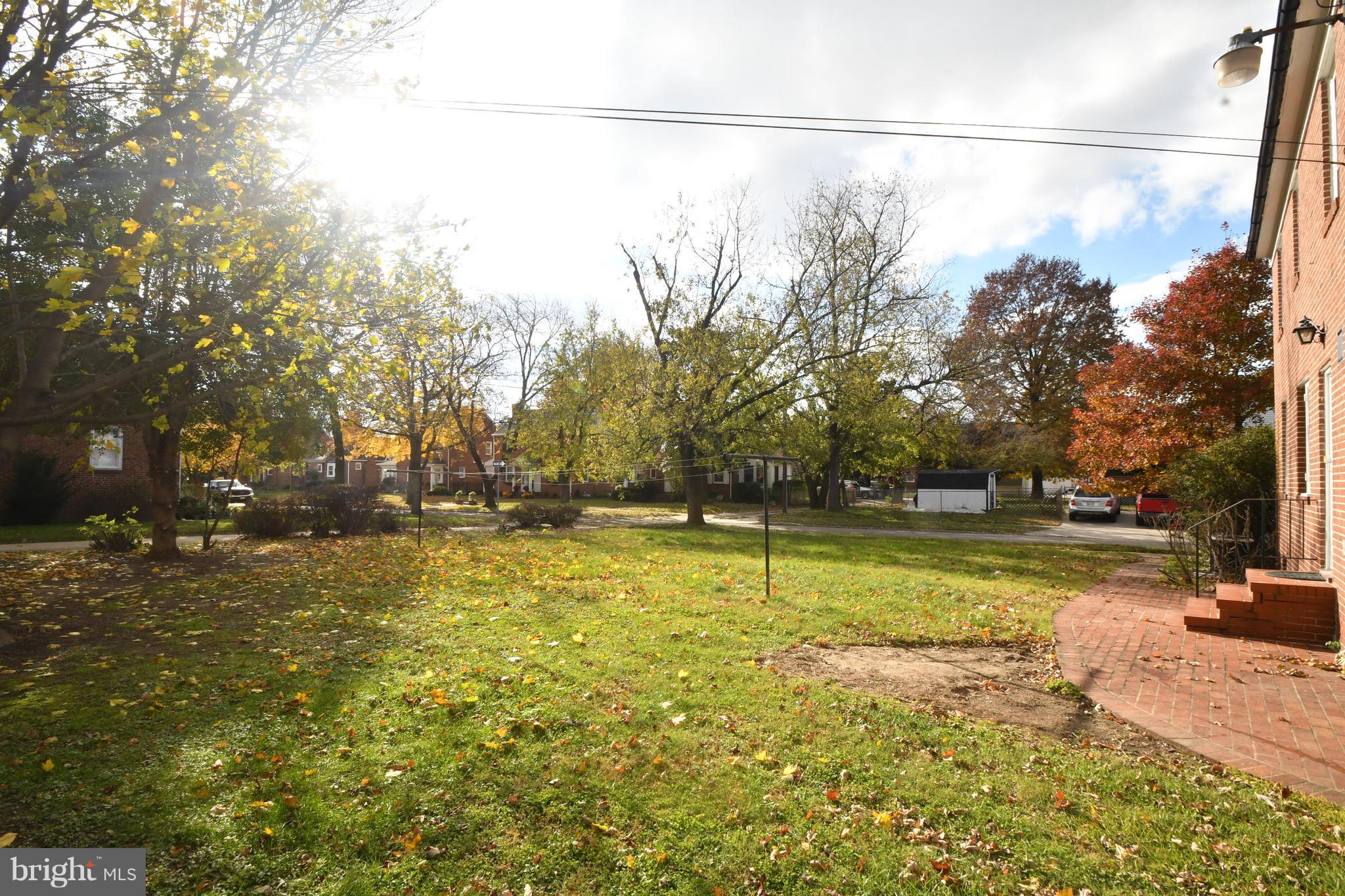 7009 Mornington Road Dundalk, MD 21222 - Photo 43 of 48 a view of a yard with trees