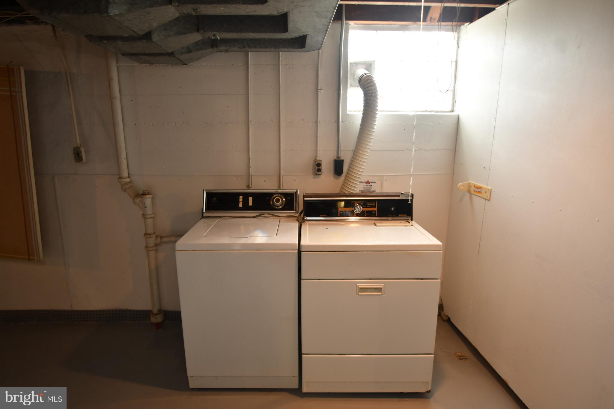 7009 Mornington Road Dundalk, MD 21222 - Photo 45 of 48 a utility room with dryer and washer