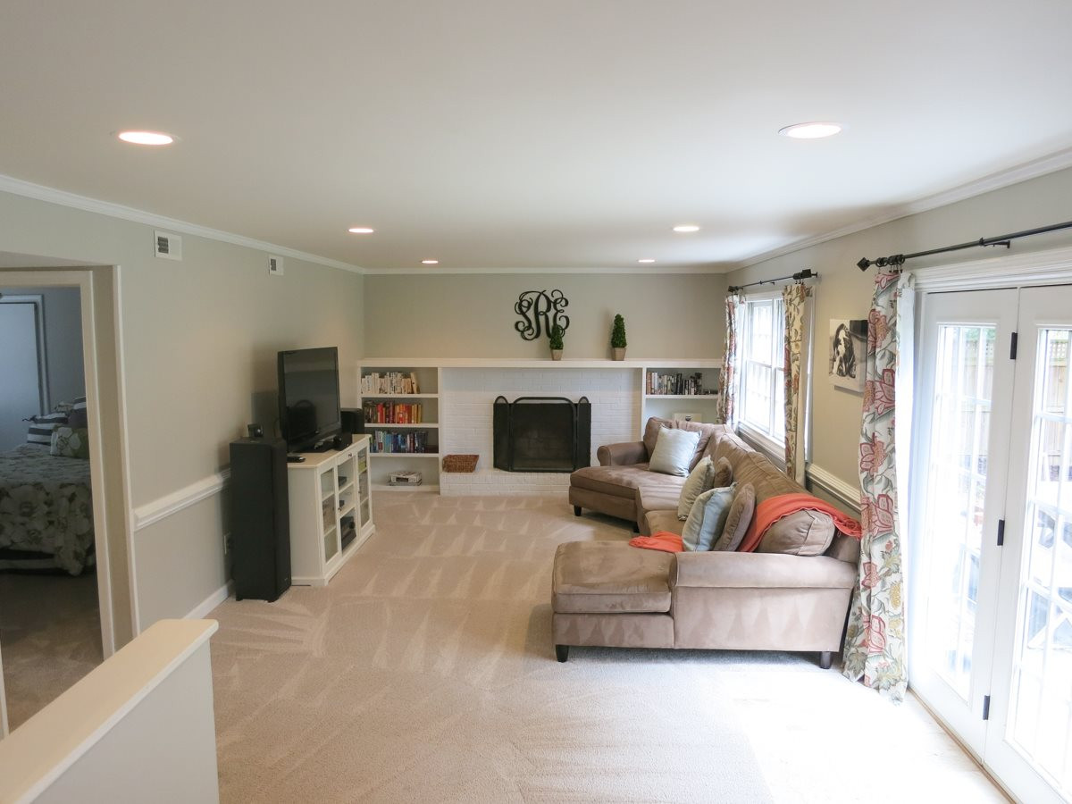 912 Hardimont Road Raleigh, NC 27609 - Photo 12 of 25 The huge Family Rm offers neutral carpet, chair rail & crown molding, painted brick woodburning FP flanked by bookcases & French doors to the Patio. Family Room