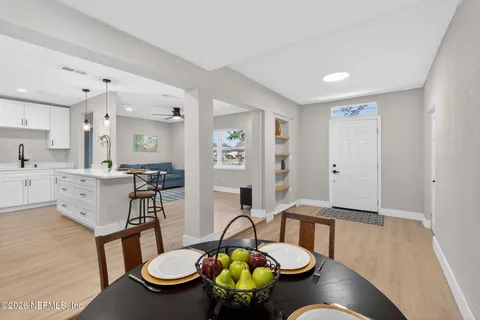a view of a dining room with furniture