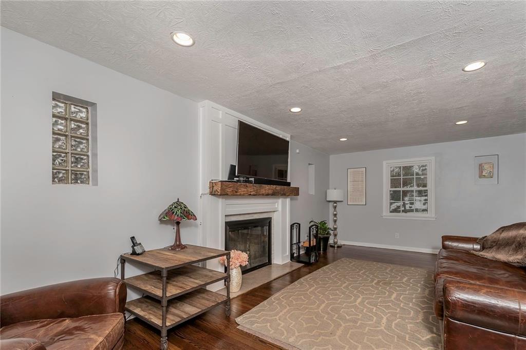337 Sleepy Hollow Road Pittsburgh, PA 15228 - Photo 4 of 24 Nice gas fireplace with marble tile surround.