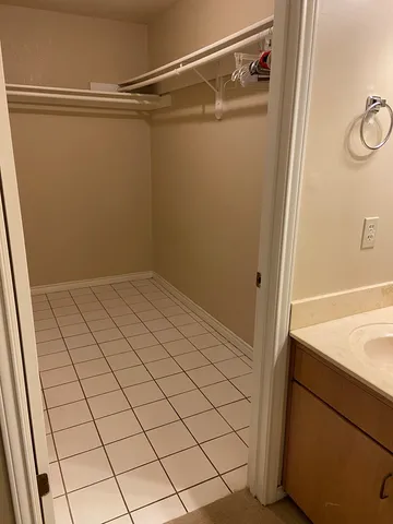 a view of a room with racks on the wall