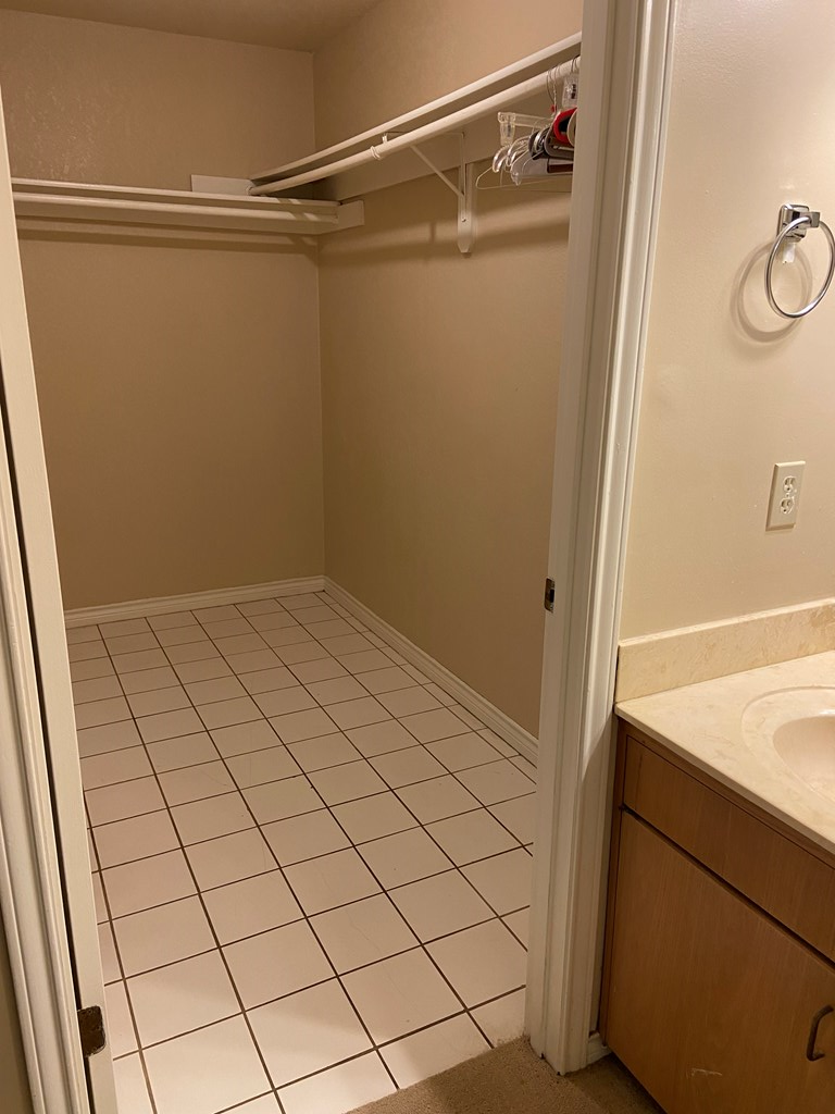 802 Lois Street Kerrville, TX 78028 - Photo 13 of 25 a view of a room with racks on the wall