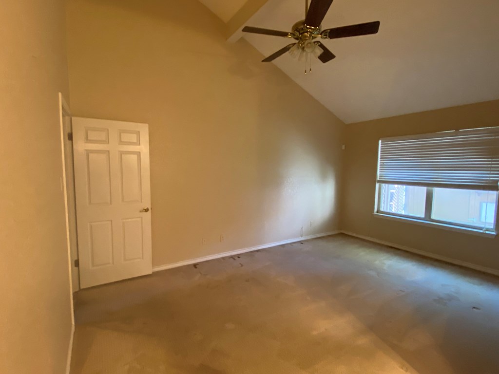 802 Lois Street Kerrville, TX 78028 - Photo 4 of 25 an empty room with windows