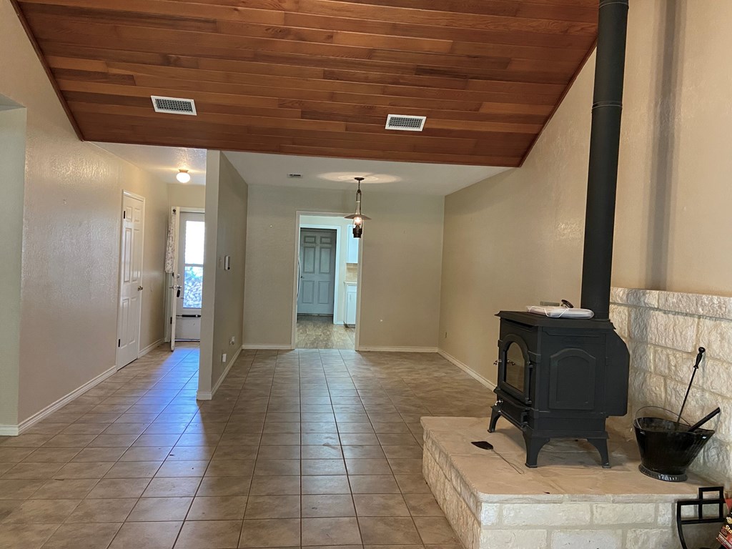 802 Lois Street Kerrville, TX 78028 - Photo 6 of 25 a view of a hallway with workspace