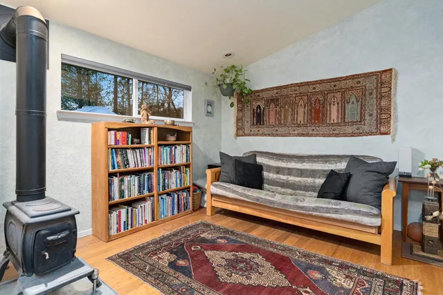 a view of balcony with wooden floor