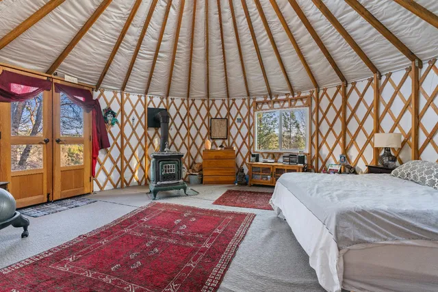 a view of house with yard