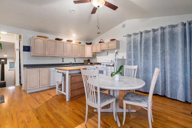 a bedroom with furniture and a book shelf