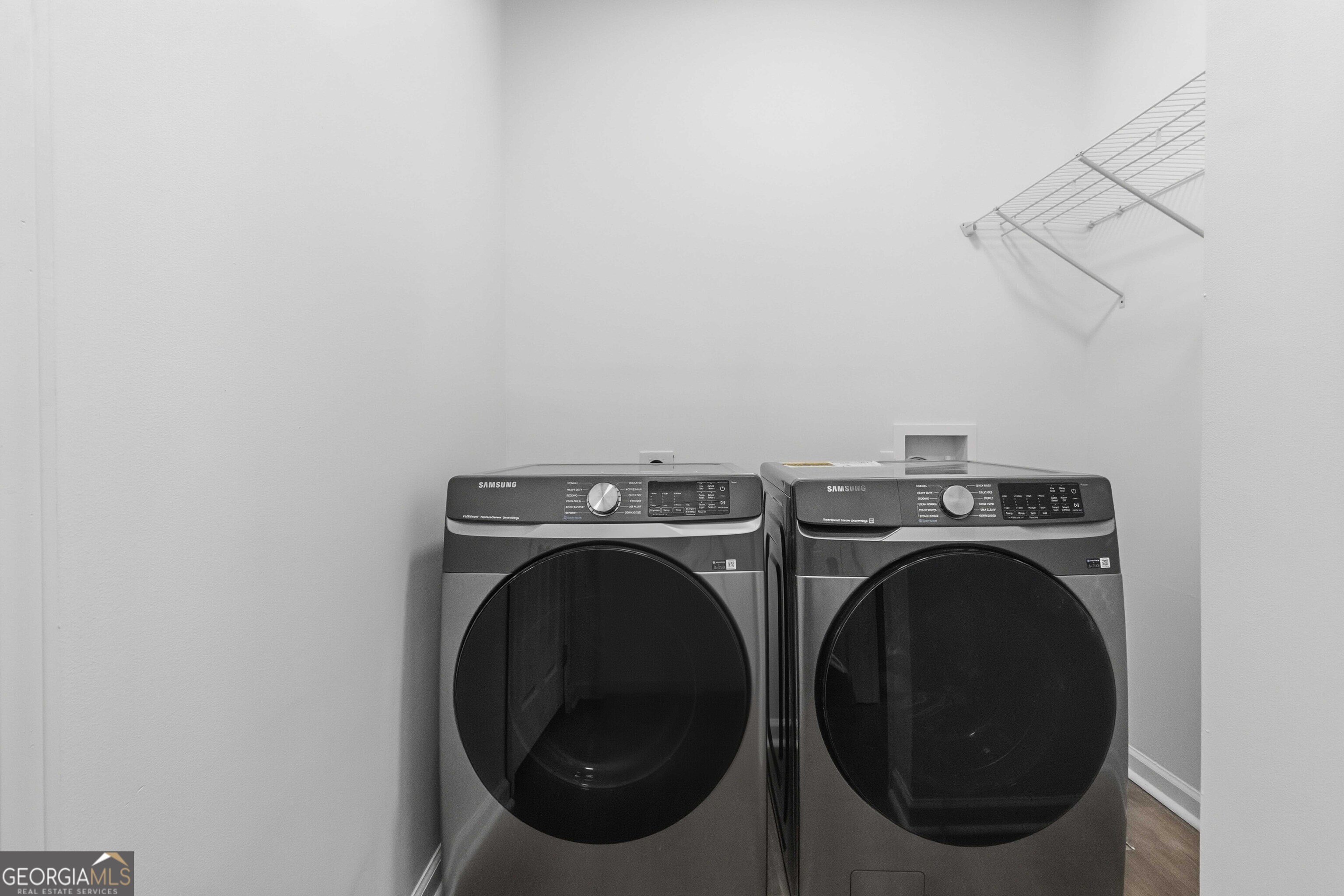 6938 Shadow Ridge Lane Stone Mountain, GA 30087 - Photo 16 of 27 a utility room with dryer and washer