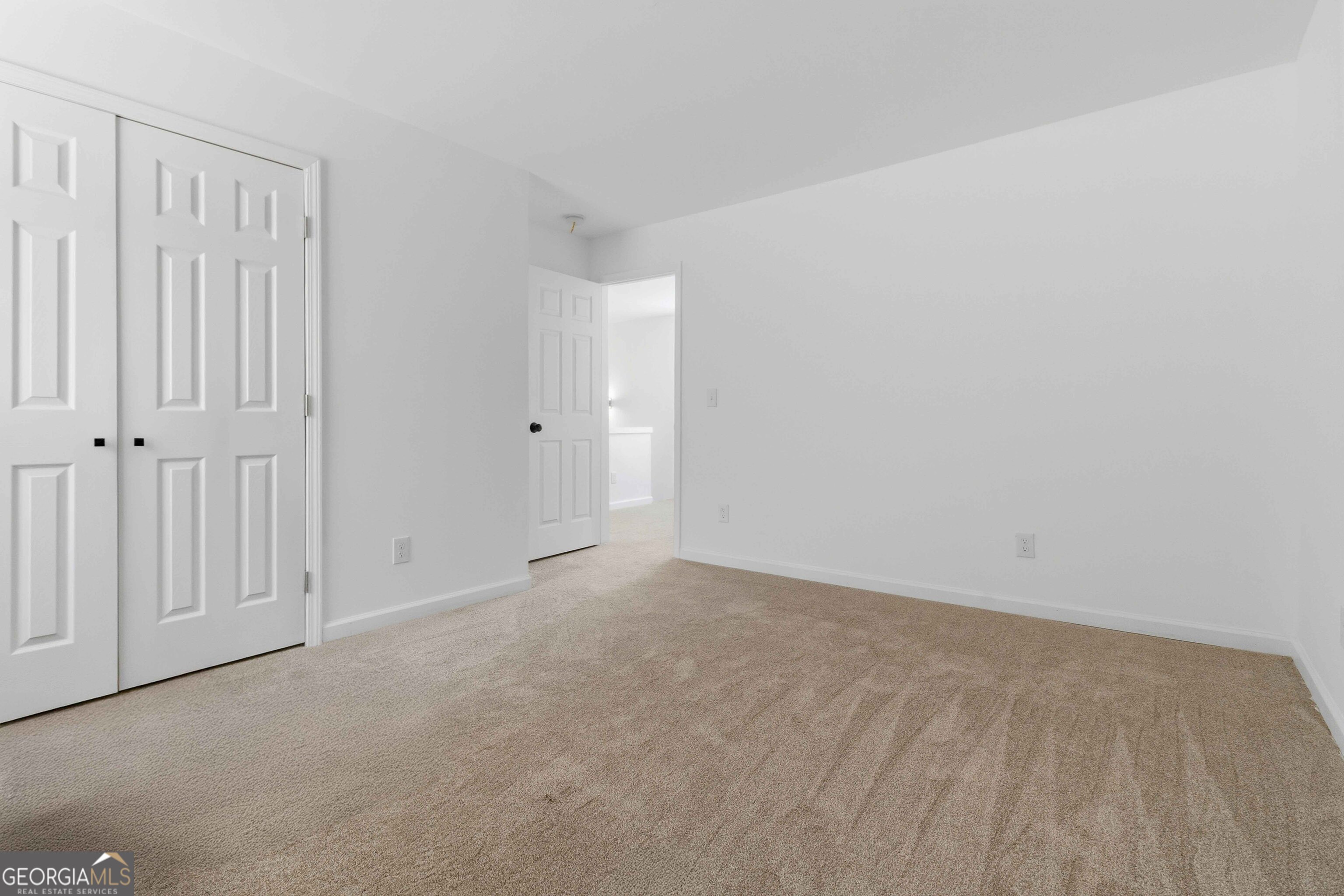 6938 Shadow Ridge Lane Stone Mountain, GA 30087 - Photo 18 of 27 a view of an empty room