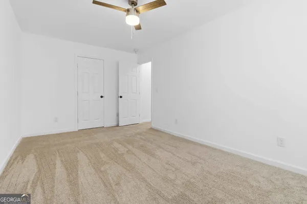 an empty room with windows