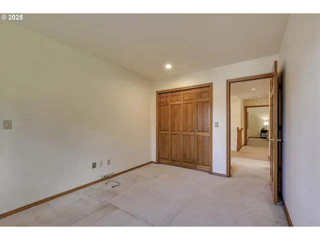 a view of a livingroom and a hallway