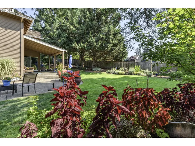 a view of a backyard with garden