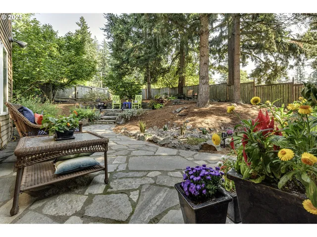a view of outdoor space with deck and tree