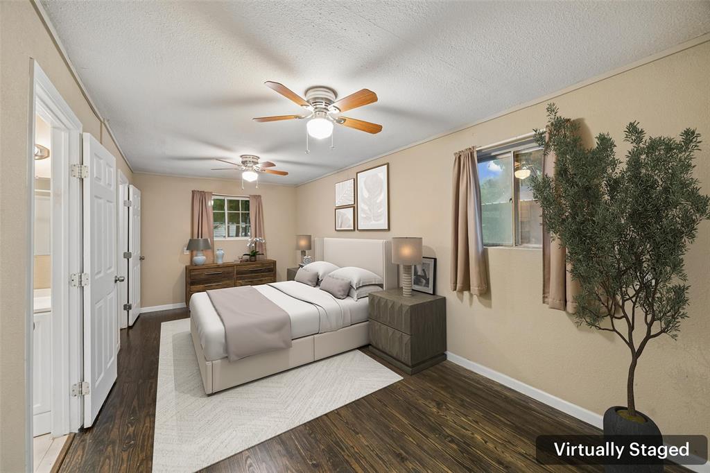 117 Moon Street Cleburne, TX 76033 - Photo 15 of 28 a living room with furniture a chandelier and a large window