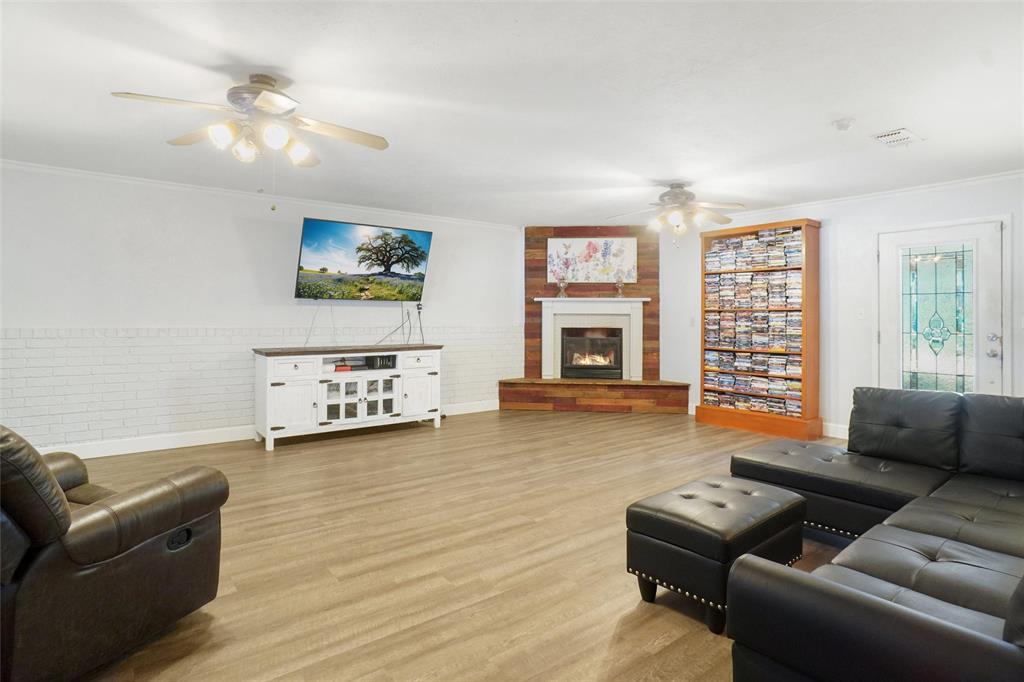 3200 Farm To Market 51 Decatur, TX 76234 - Photo 2 of 22 a living room with furniture and a flat screen tv