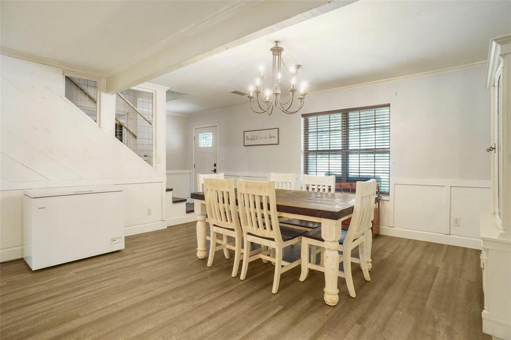 3200 Farm To Market 51 Decatur, TX 76234 - Photo 8 of 22 a view of a dining room with furniture wooden floor and chandelier