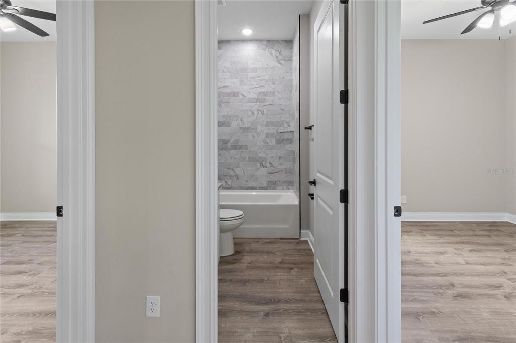 3620 Garrard Road Fort Meade, FL 33841 - Photo 11 of 33 a view of a bathroom from a corridor