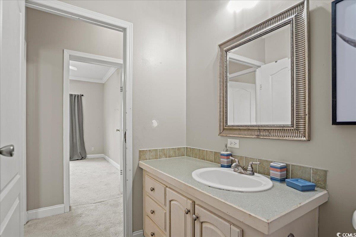 706 Beverly Hills Road Camden, SC 29020 - Photo 16 of 25 Half bath featuring vanity and light colored carpet
