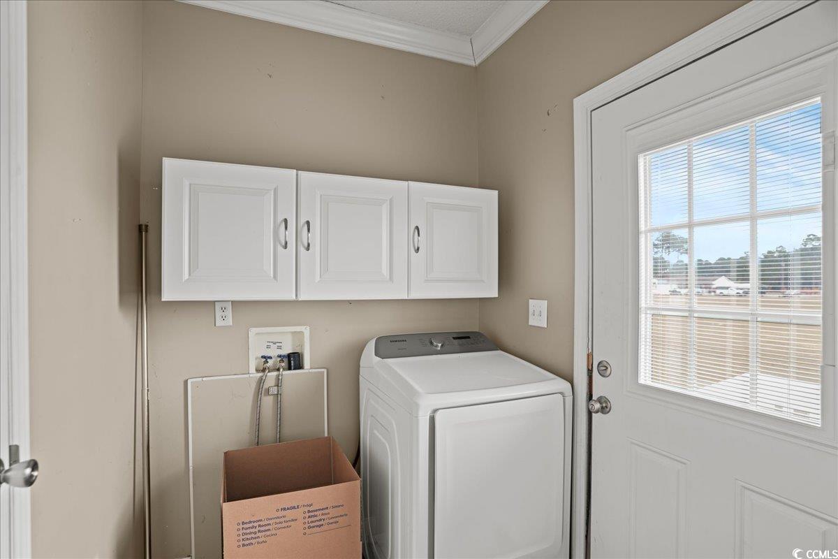 706 Beverly Hills Road Camden, SC 29020 - Photo 20 of 25 Laundry area with washer / clothes dryer, cabinet space, and ornamental molding