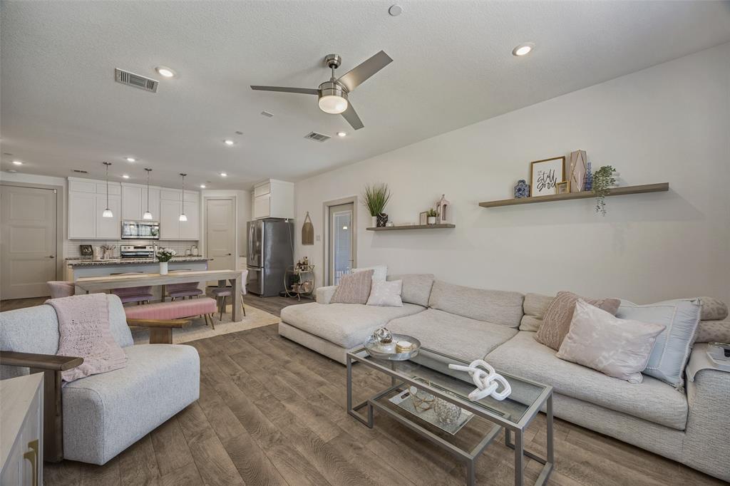 1650 Jessica Lane Allen, TX 75002 - Photo 3 of 25 a living room with furniture and kitchen view