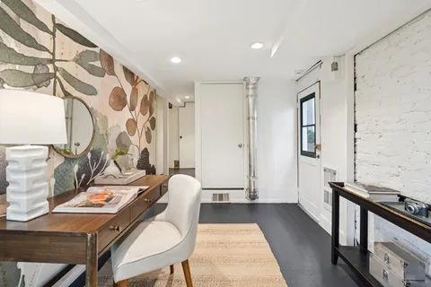 a kitchen with a stove and a sink