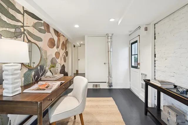 a kitchen with a stove and a sink