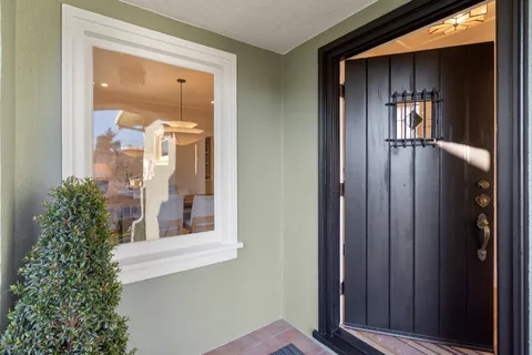 front view of a house with a glass door