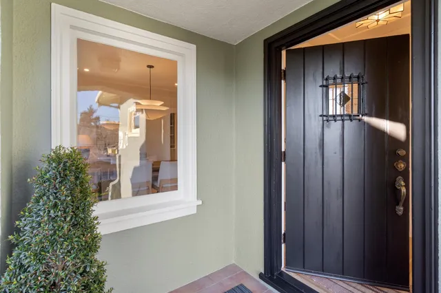 front view of a house with a glass door