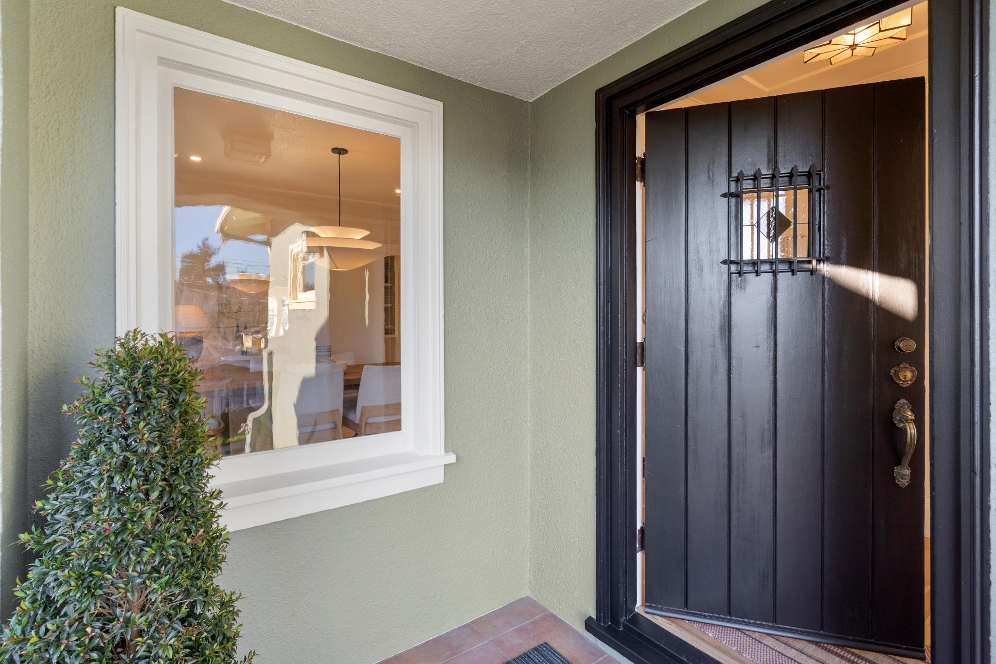1117 Ranleigh Way Piedmont, CA 94610 - Photo 3 of 45 front view of a house with a glass door