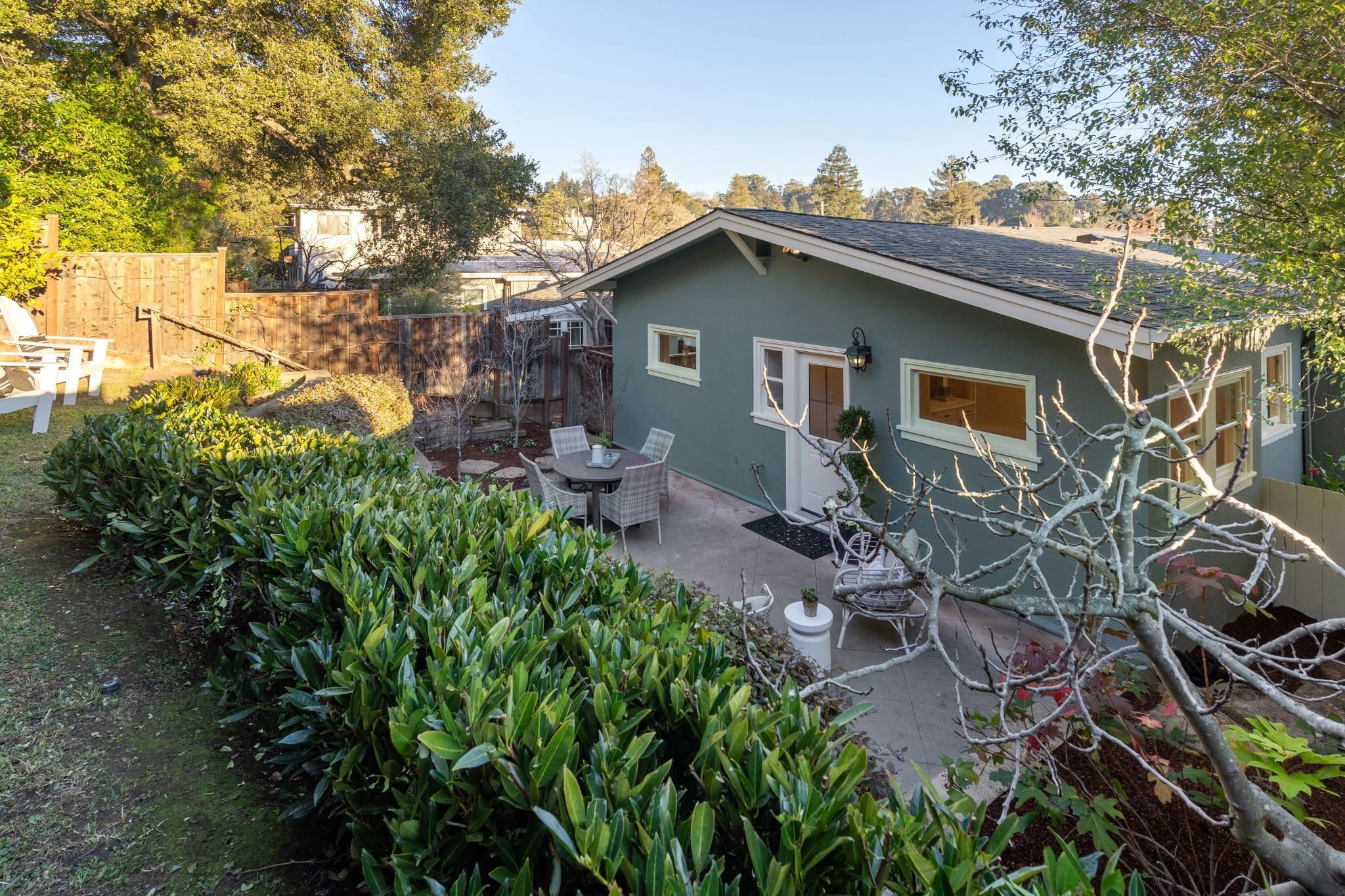 1117 Ranleigh Way Piedmont, CA 94610 - Photo 31 of 45 a backyard of a house with table and chairs