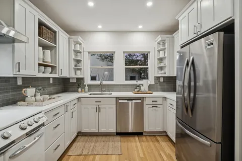 a view of a chairs and table in the patio
