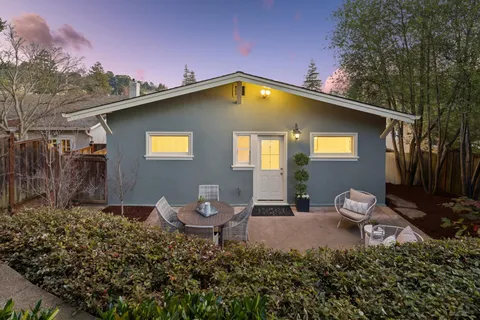 a picture of a book and a potted plant