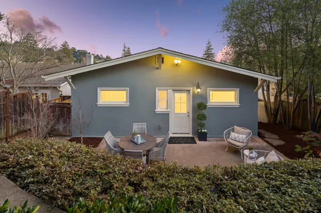 a picture of a book and a potted plant