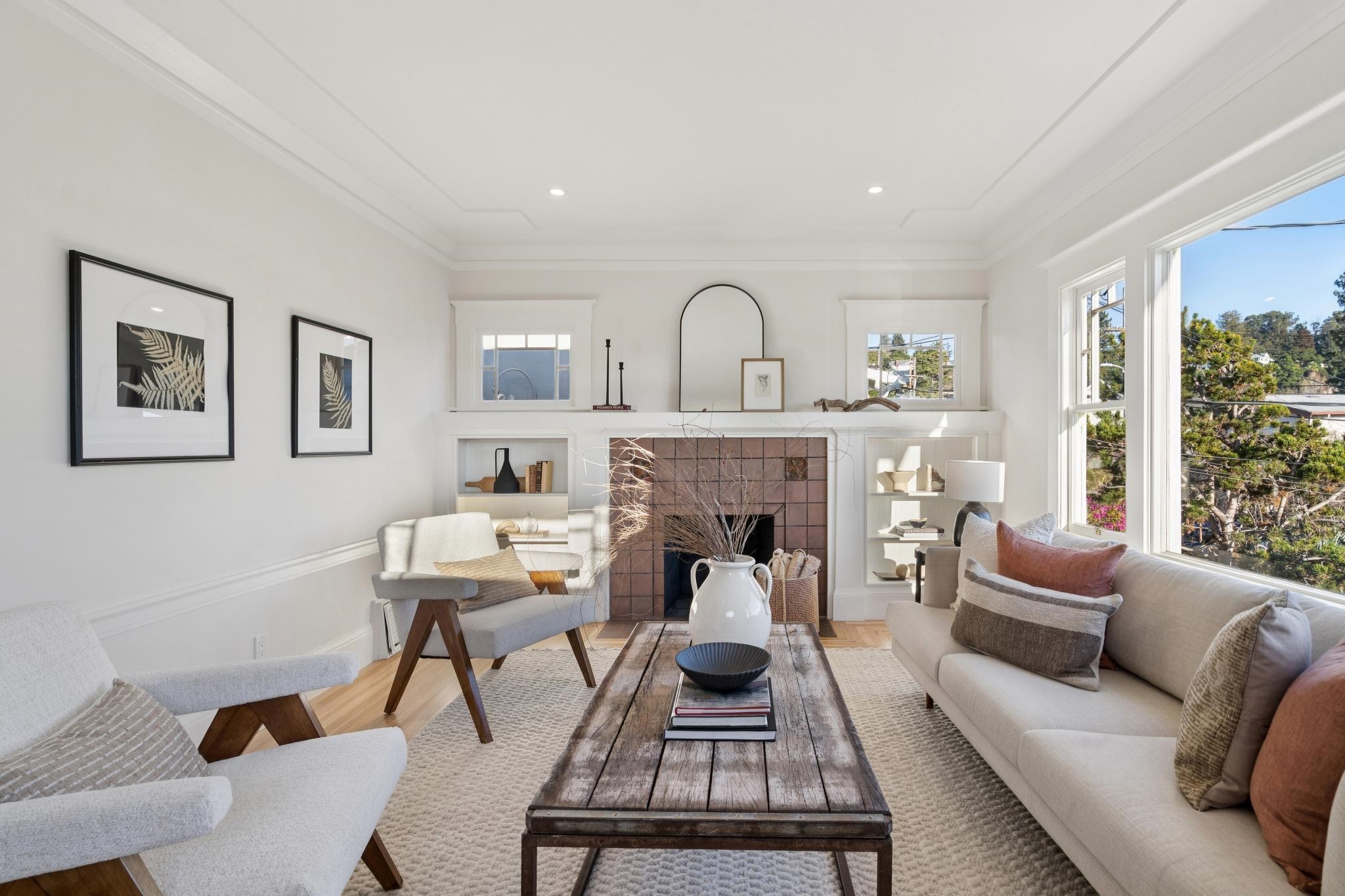 1117 Ranleigh Way Piedmont, CA 94610 - Photo 6 of 45 a living room with furniture and a fireplace