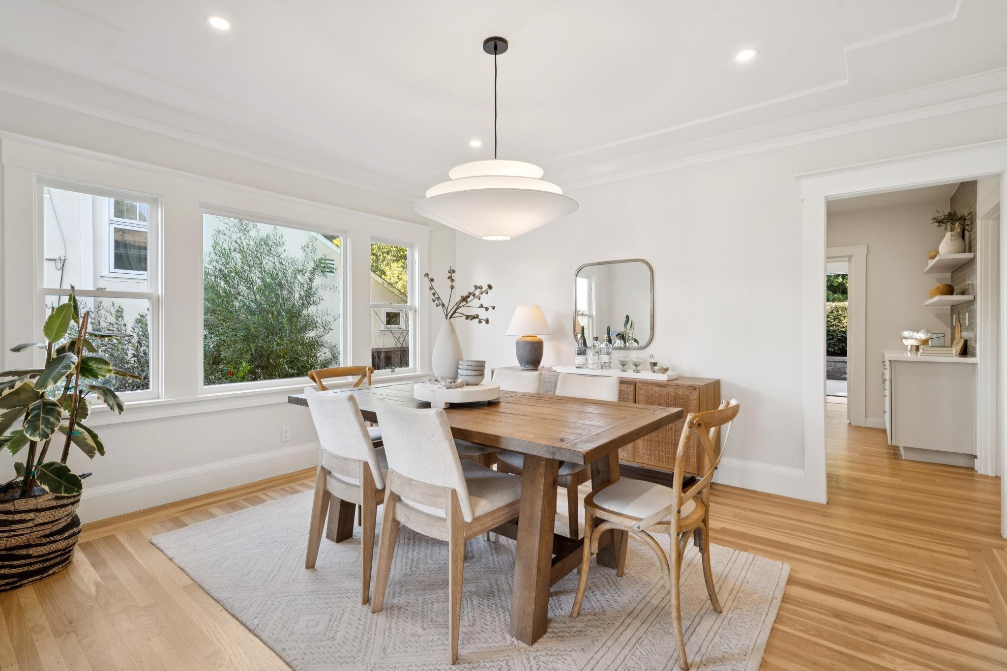 1117 Ranleigh Way Piedmont, CA 94610 - Photo 9 of 45 a view of a dining room with furniture window and wooden floor