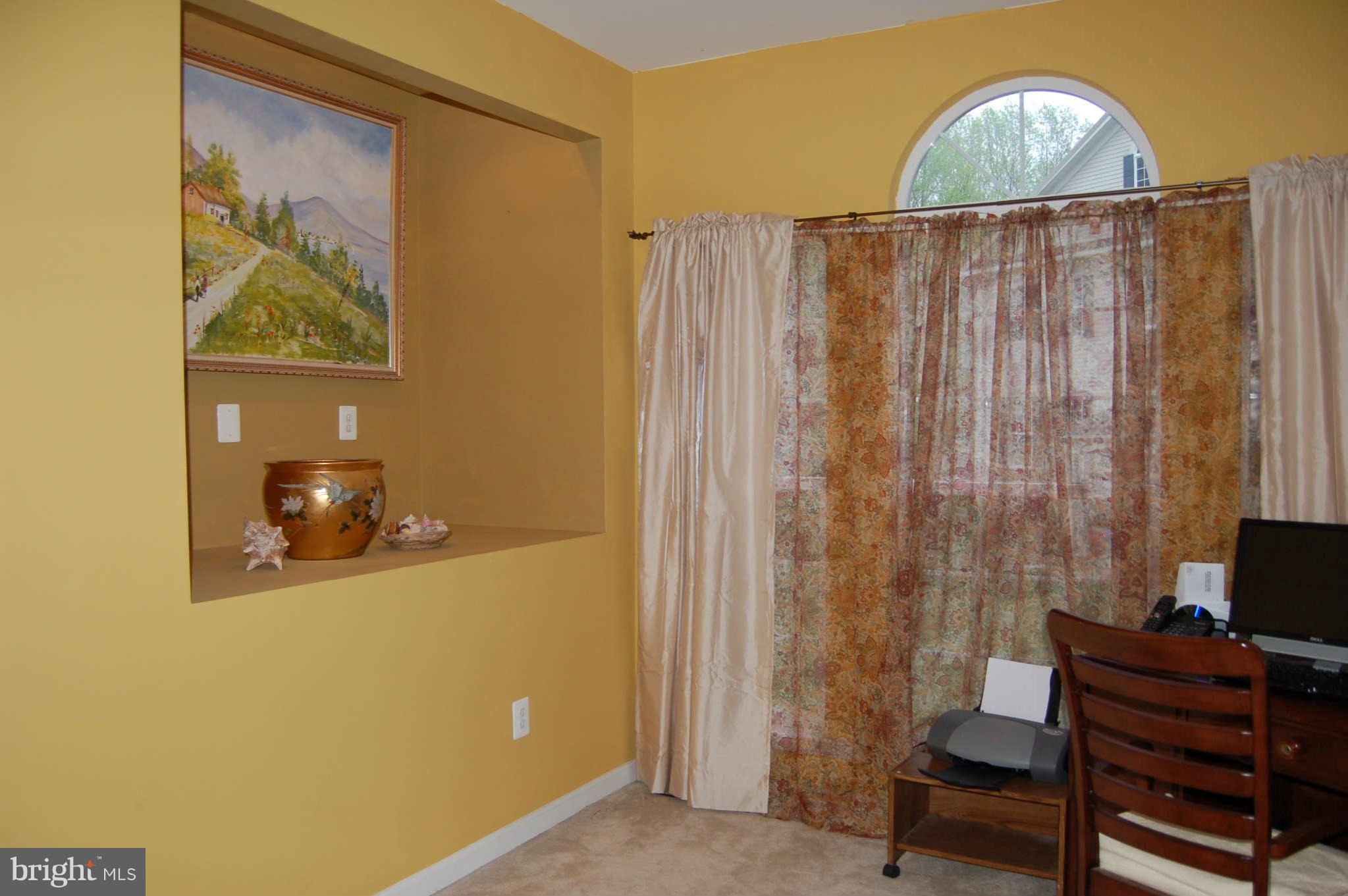 18812 Broken Oak Road Boyds, MD 20841 - Photo 11 of 30 a view of a room with a window and furniture