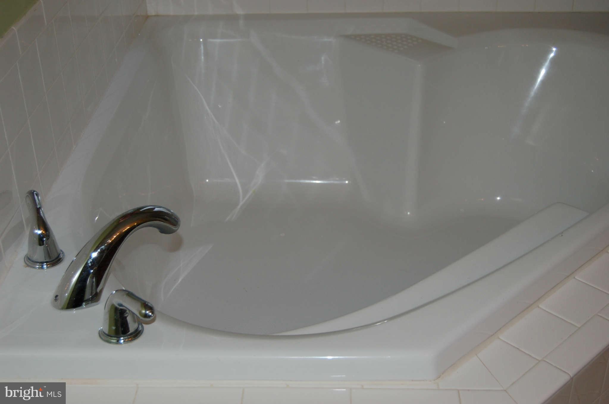 18812 Broken Oak Road Boyds, MD 20841 - Photo 17 of 30 a bathroom with a shower