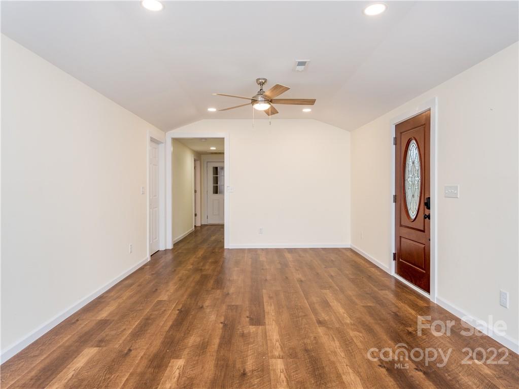 16 Jaffe Road Rosman, NC 28772 - Photo 11 of 20 a view of empty room with wooden floor and ceiling fan