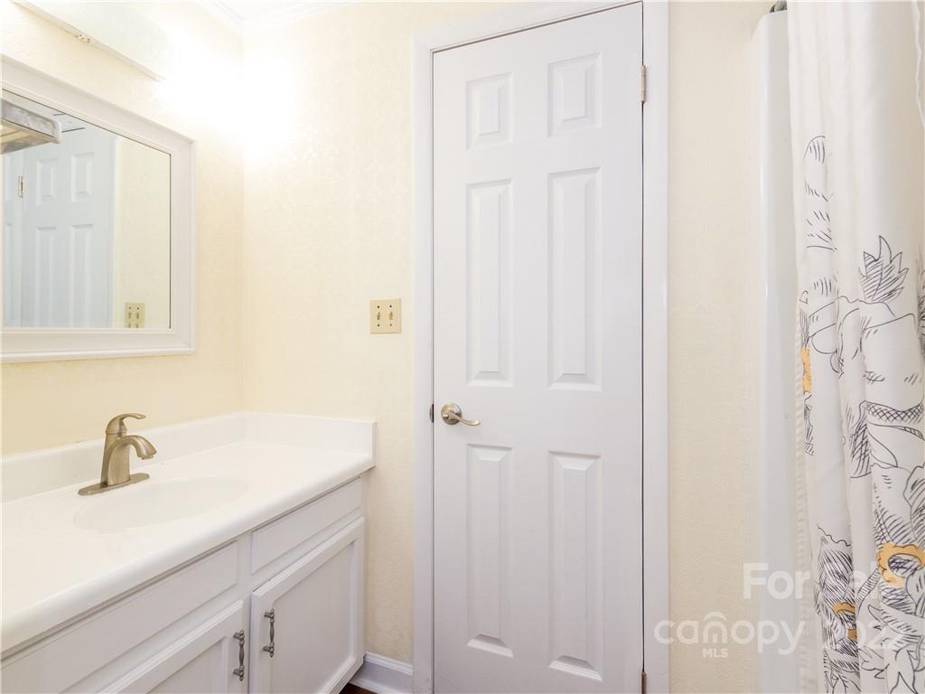 16 Jaffe Road Rosman, NC 28772 - Photo 12 of 20 a bathroom with a sink and vanity
