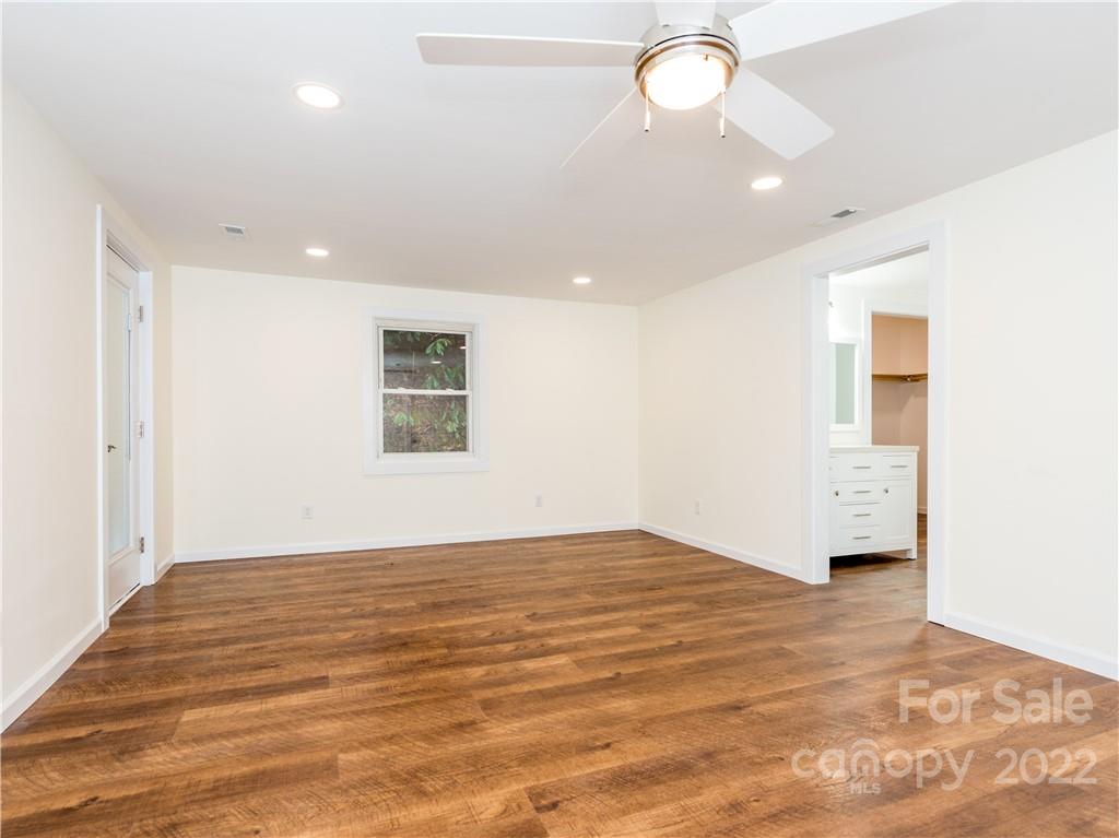 16 Jaffe Road Rosman, NC 28772 - Photo 15 of 20 a view of an empty room with window and wooden floor