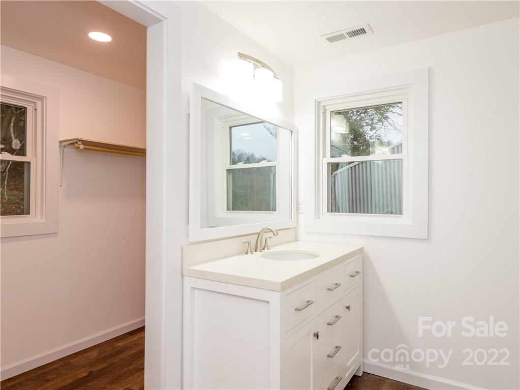16 Jaffe Road Rosman, NC 28772 - Photo 17 of 20 a bathroom with a sink and a mirror